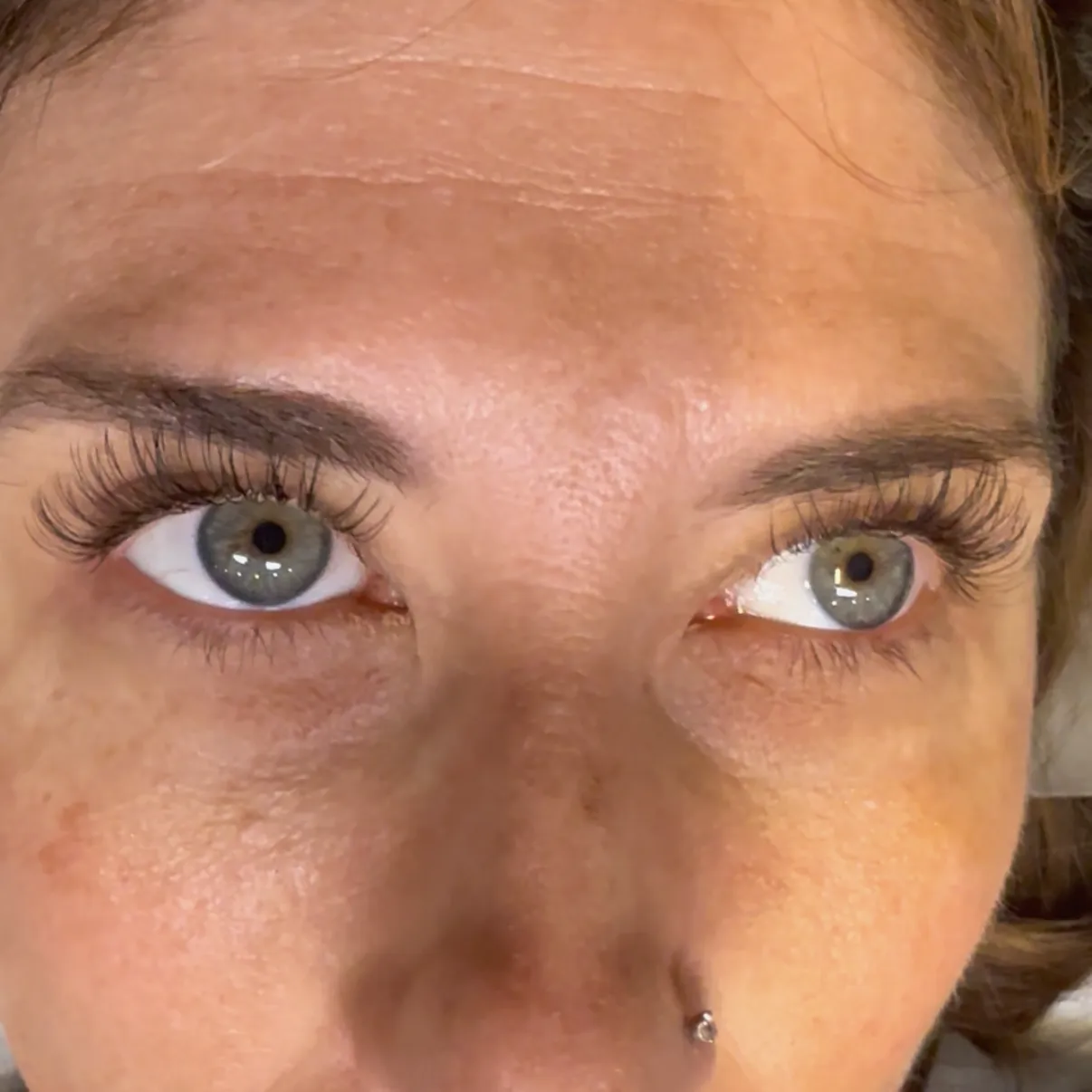Close-up of a fresh eyelash extension set