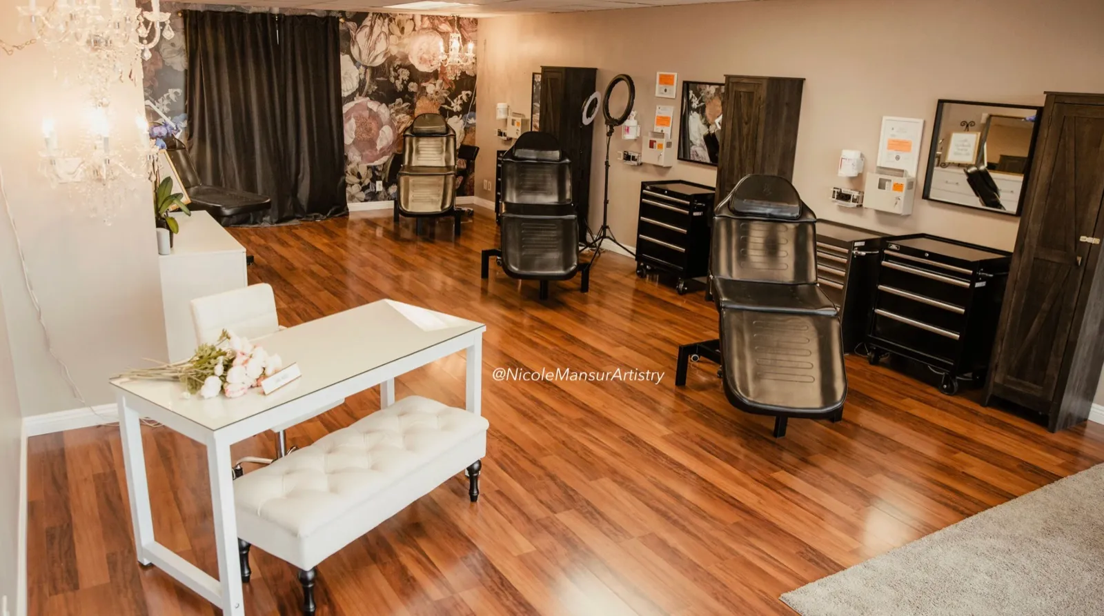 Studio overview with beauty treatment stations at the Huntington Beach studio